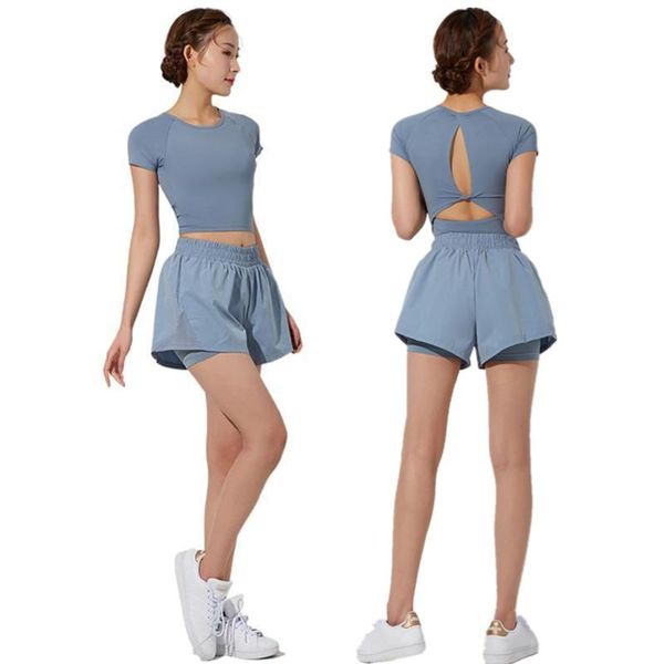 yoga outfit sports fitness suit beautiful back hollow short sleeve t shirt with chest pad + 2 in 1 loose sport shorts women dance set
yoga outfit sports fitness suit beautiful back hollow short sleeve t shirt with chest pad + 2 in 1 loose sport shorts women dance set