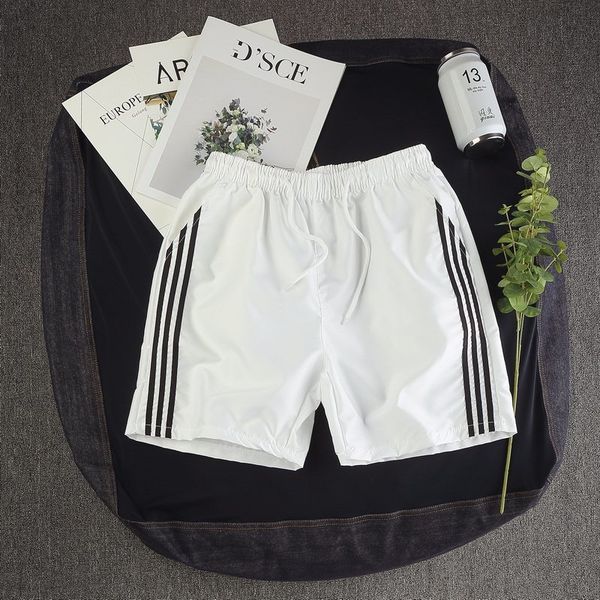 trendy leisure men's sports shorts summer loose casual solid color couple five point pants fashion straight trousers, White;black
trendy leisure men's sports shorts summer loose casual solid color couple five point pants fashion straight trousers, White;black