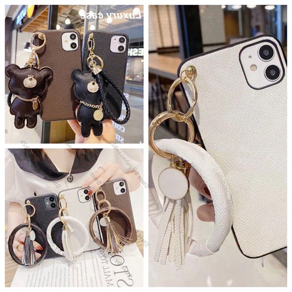 fashion leather designer phone cases with cute bear bracelet for iphone 13 12 11 pro max 13pro 12pro 11pro xr xsmax 7 8 plus case wholesale
fashion leather designer phone cases with cute bear bracelet for iphone 13 12 11 pro max 13pro 12pro 11pro xr xsmax 7 8 plus case wholesale