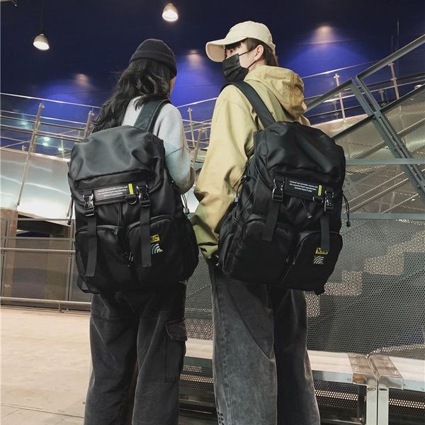 backpack double pocket clamshell buckle shoulder bag couple male and female student leisure large capacity sports bookbag 
backpack double pocket clamshell buckle shoulder bag couple male and female student leisure large capacity sports bookbag