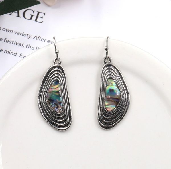 european and american fashion personality natural color shell chandelier round face show thin geometric stripes oval long accessories, Silver
european and american fashion personality natural color shell chandelier round face show thin geometric stripes oval long accessories, Silver
