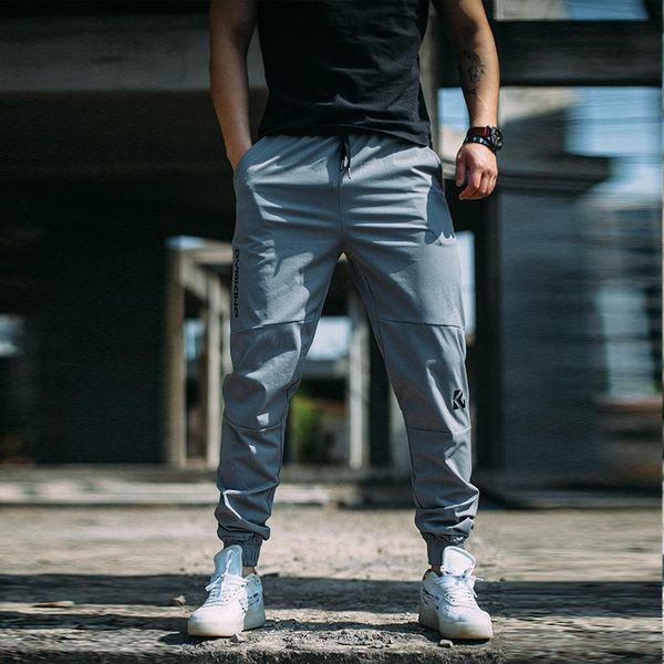 men fitness bodybuilding long pants stretch patchwork fashion sweatpants contracted quick-drying training trousers running, Black;blue
men fitness bodybuilding long pants stretch patchwork fashion sweatpants contracted quick-drying training trousers running, Black;blue