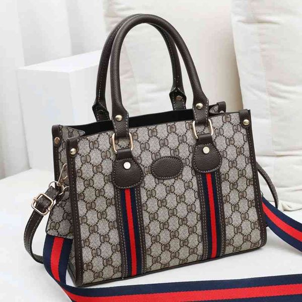 design women's new fashion versatile hand big bag popular women's one shoulder messenger tote bag handbags
design women's new fashion versatile hand big bag popular women's one shoulder messenger tote bag handbags