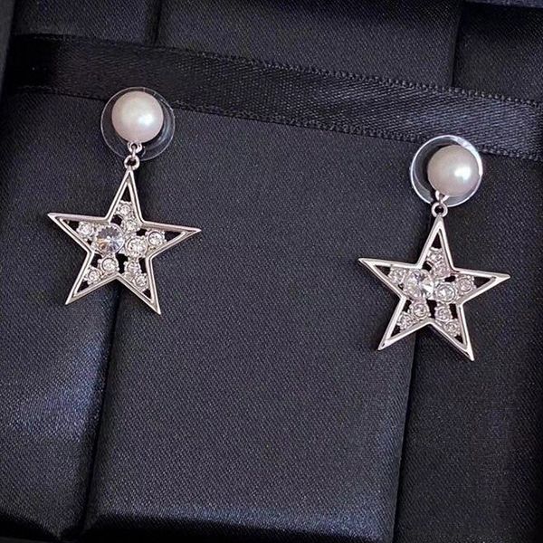 70%off miu miao's new simple hollow out five pointed star water drill popular temperament high end women's earrings 6opd, Golden
70%off miu miao's new simple hollow out five pointed star water drill popular temperament high end women's earrings 6opd, Golden