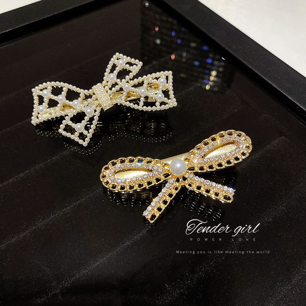pearl diamond bow hollow hairpin design of south designer east gate hair ornament simple personality net red headdress female, Golden;silver
pearl diamond bow hollow hairpin design of south designer east gate hair ornament simple personality net red headdress female, Golden;silver