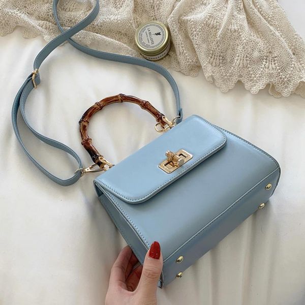 solid color square crossbody bag 2021 high-quality pu leather women's designer handbag shoulder with bamboo handheld evening bags
solid color square crossbody bag 2021 high-quality pu leather women's designer handbag shoulder with bamboo handheld evening bags