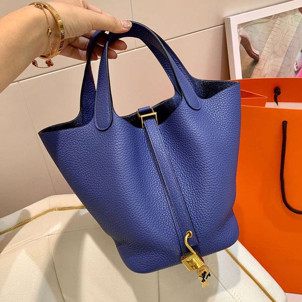 h family leather women's bag vegetable basket hand bucket head cowhide litchi pattern simple tassel fashion
h family leather women's bag vegetable basket hand bucket head cowhide litchi pattern simple tassel fashion