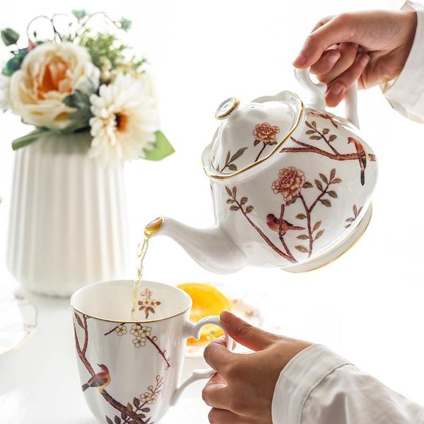 british style tea cup and saucers set porcelain pot teacup dinner plates household teaware sets coffeeware supplier cups &
british style tea cup and saucers set porcelain pot teacup dinner plates household teaware sets coffeeware supplier cups &