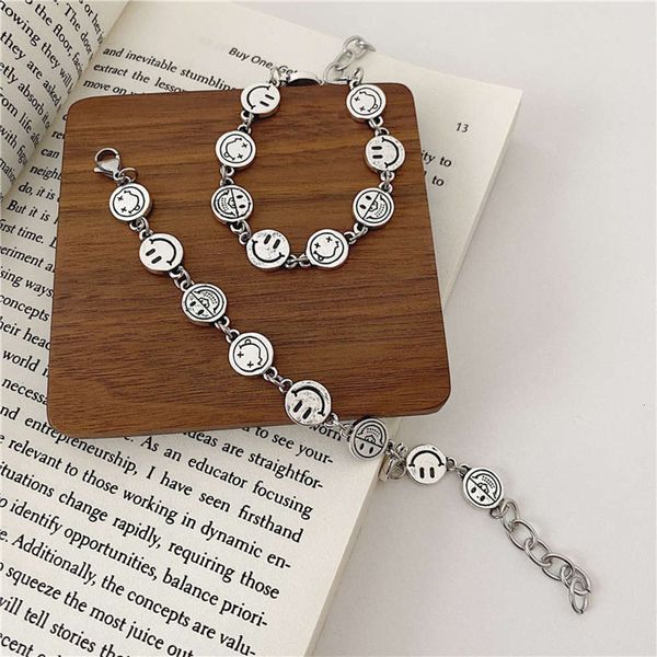 version make old multi expression bag female korean east gate hip hop cute smile round brand bracelet, Black
version make old multi expression bag female korean east gate hip hop cute smile round brand bracelet, Black