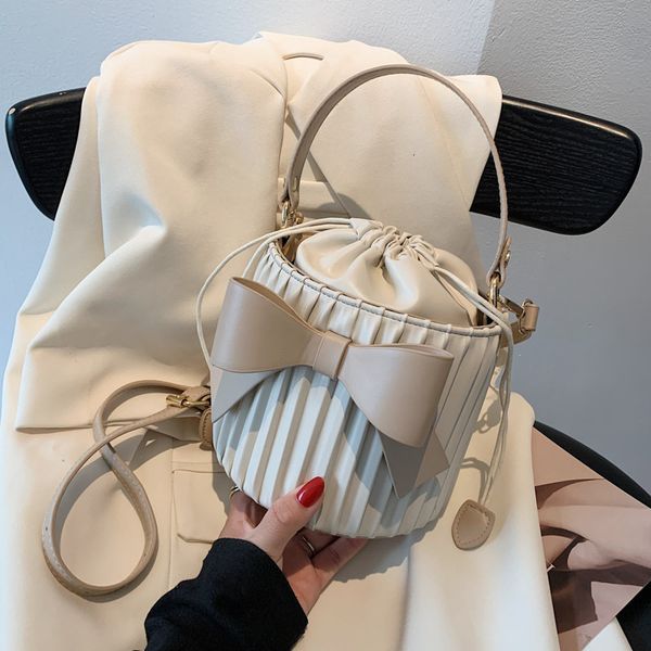handbag fashion bow knot bucket bag women's 2021 summer trend solid color small single shoulder pleated messenger
handbag fashion bow knot bucket bag women's 2021 summer trend solid color small single shoulder pleated messenger