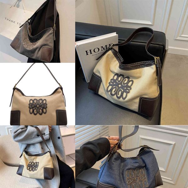 design large capacity canvas bag women's new fashion style one shoulder armpit leisure messenger bucket bag purses outlet
design large capacity canvas bag women's new fashion style one shoulder armpit leisure messenger bucket bag purses outlet