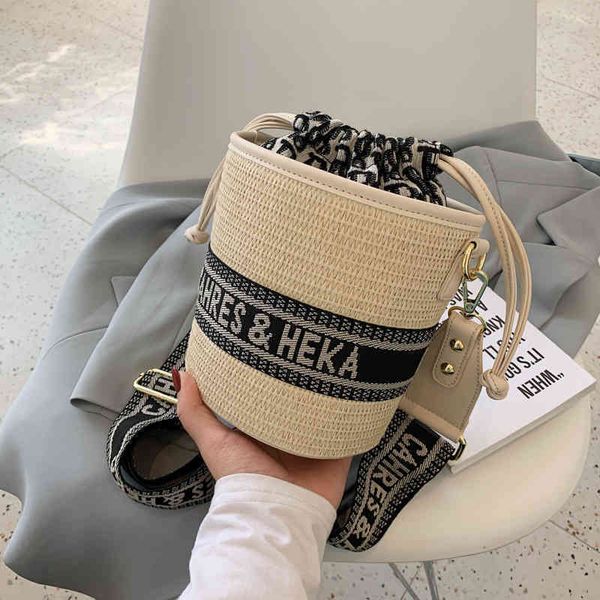 2022 factory outlet net red wide shoulder strap letter bucket bag women's summer fashion straw woven single shoulder messenger bag xzpd
2022 factory outlet net red wide shoulder strap letter bucket bag women's summer fashion straw woven single shoulder messenger bag xzpd
