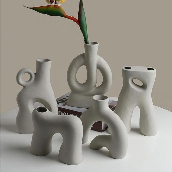vases white hollow ceramic vase dried flower hydroponic container art ornaments living room counterhome gift
vases white hollow ceramic vase dried flower hydroponic container art ornaments living room counterhome gift