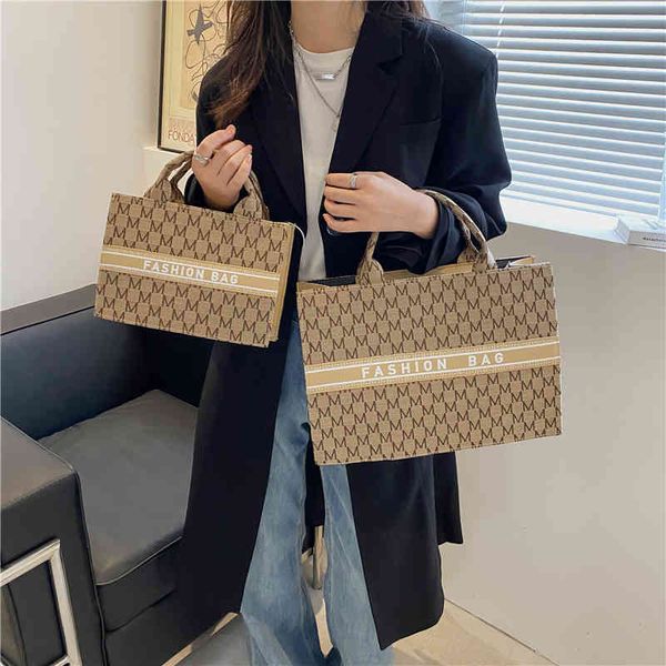 2022 factory wholesale new autumn canvas letter simple portable tote bag foreign style fashion leisure personalized women's bag
2022 factory wholesale new autumn canvas letter simple portable tote bag foreign style fashion leisure personalized women's bag