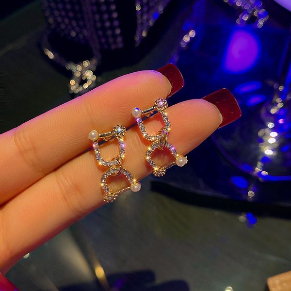 925 silver needle geometric hourglass personalized design inlaid with diamond pearl earrings fashion fashion earrings fashion net red, Golden;silver
925 silver needle geometric hourglass personalized design inlaid with diamond pearl earrings fashion fashion earrings fashion net red, Golden;silver