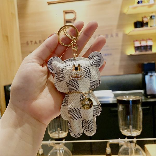 keychains straight inlaid diamond bear pendant creative car key chain korean schoolbag bag, Silver
keychains straight inlaid diamond bear pendant creative car key chain korean schoolbag bag, Silver