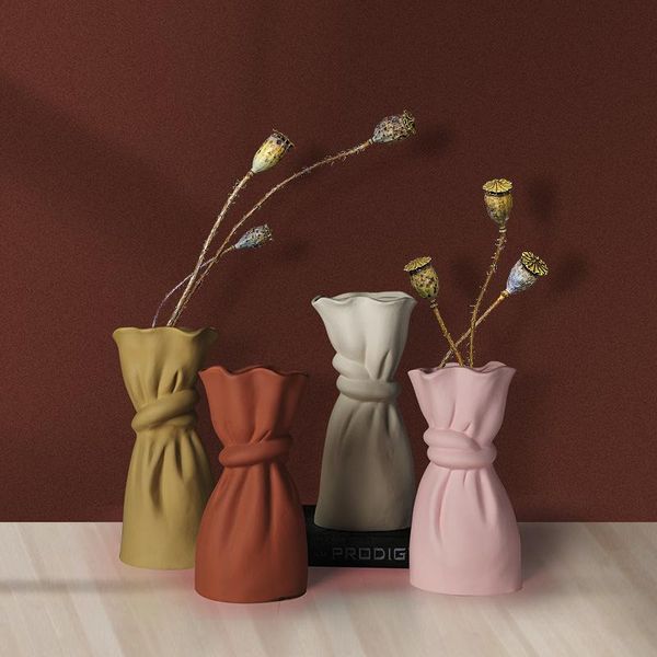vases cloth bag ceramic dry vase creative ornaments crafts restaurant decorations flower arrangement light luxury household
vases cloth bag ceramic dry vase creative ornaments crafts restaurant decorations flower arrangement light luxury household