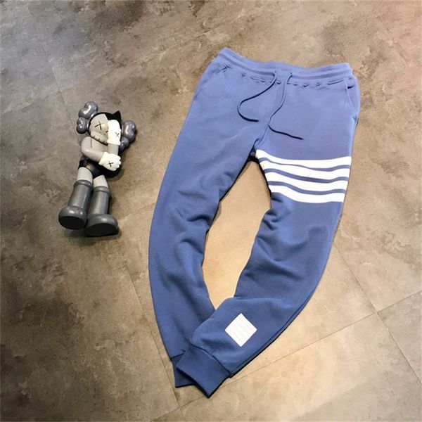 spring striped print sportswear casual loose tie small straight leg pants for men and women, White;black
spring striped print sportswear casual loose tie small straight leg pants for men and women, White;black
