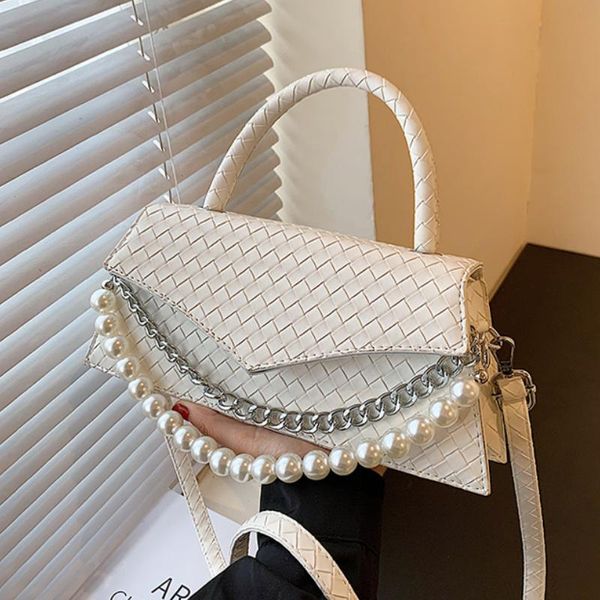 shoulder bags chain weave tote bag 2021 pearl summer high-quality pu leather women's designer handbag messenger
shoulder bags chain weave tote bag 2021 pearl summer high-quality pu leather women's designer handbag messenger