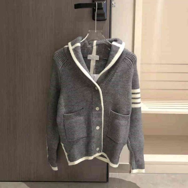 autumn new fashion lapel three bar single breasted loose casual thin knitted coat, White
autumn new fashion lapel three bar single breasted loose casual thin knitted coat, White
