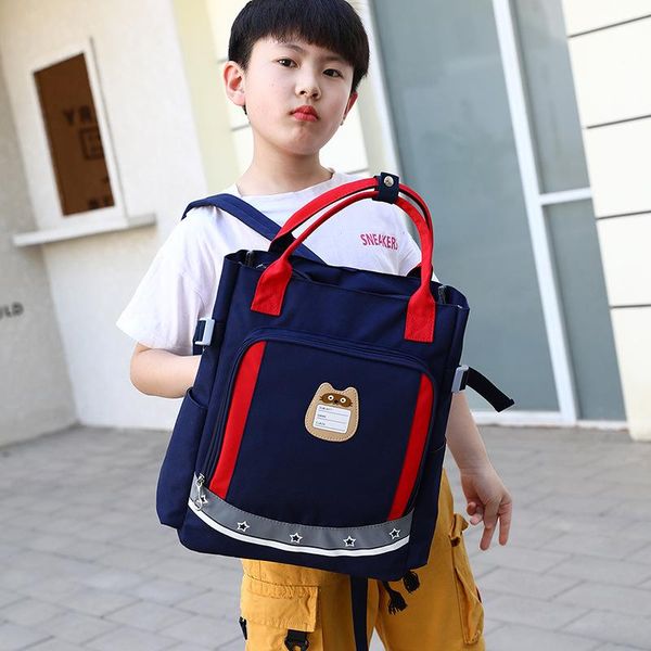 backpack student cartoon shoulder bag light and wear-resistant reflective strip primary schoolbags training class portable cram bags 
backpack student cartoon shoulder bag light and wear-resistant reflective strip primary schoolbags training class portable cram bags