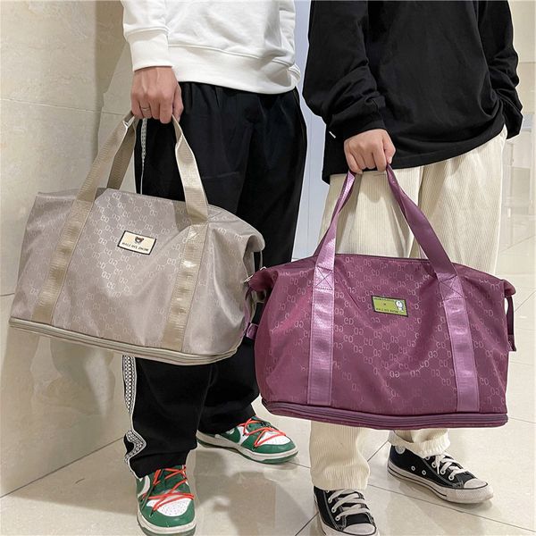 bag female portable large capacity short distance light travel fitness single shoulder male sports student luggage
bag female portable large capacity short distance light travel fitness single shoulder male sports student luggage