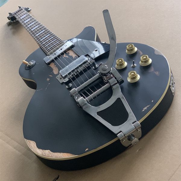 custom electric guitar old black worn aged guitar, mother of pearl inlay, solid thick maple cap, viabrato
custom electric guitar old black worn aged guitar, mother of pearl inlay, solid thick maple cap, viabrato