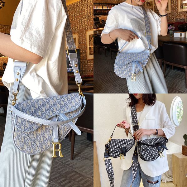 bag female new printed canvas portable saddle bag style wide shoulder strap mobile phone messenger handbags
bag female new printed canvas portable saddle bag style wide shoulder strap mobile phone messenger handbags