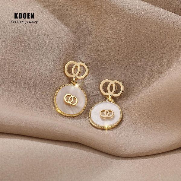 classic white shell metal double ring pendant earrings for woman fashion korean jewelry girl's simple unusual dangle & chandelier, Silver
classic white shell metal double ring pendant earrings for woman fashion korean jewelry girl's simple unusual dangle & chandelier, Silver