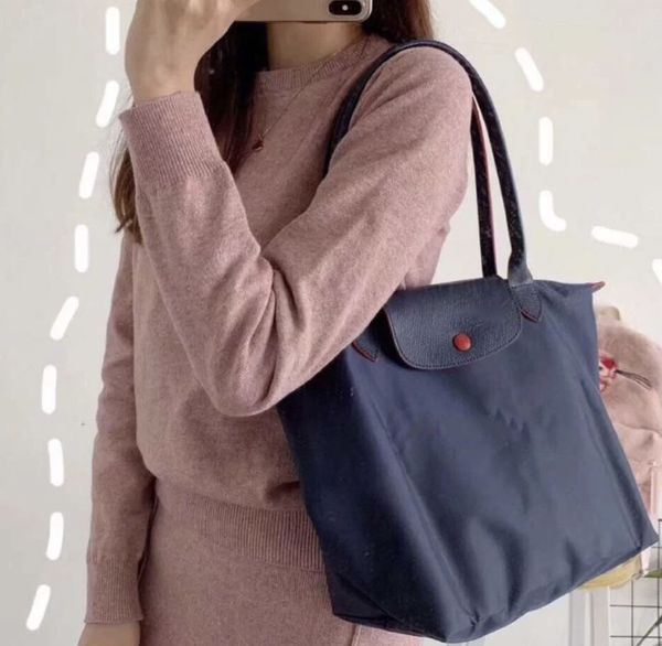 oxford cloth dumpling one shoulder hand longxiang leisure large capacity mami shopping tote women's bag
oxford cloth dumpling one shoulder hand longxiang leisure large capacity mami shopping tote women's bag