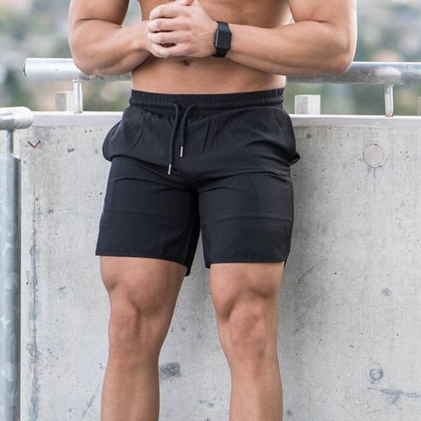 new mens quick dry shorts calf-length gyms fitness bodybuilding joggers workout brand sporting short pants sportswear sweatpants 210421, White;black
new mens quick dry shorts calf-length gyms fitness bodybuilding joggers workout brand sporting short pants sportswear sweatpants 210421, White;black