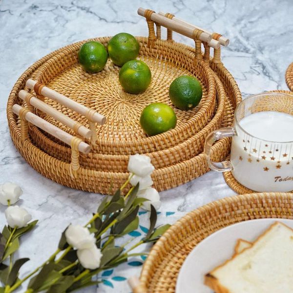 hand-woven rattan round basket tray with handle bread fruit storage platters plate for breakfast drink snack coffee tea baskets
hand-woven rattan round basket tray with handle bread fruit storage platters plate for breakfast drink snack coffee tea baskets