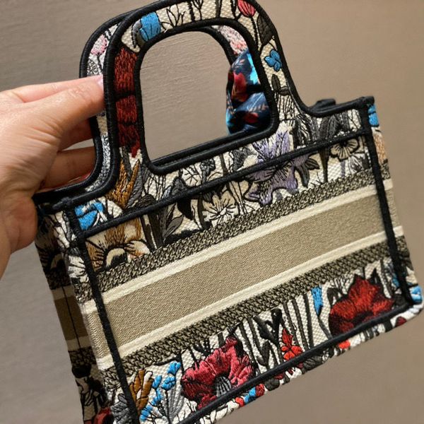 handbag christian new fashion mini shopping bag in spring and summer of 2021 portable canvas embroidery versatile women's luxurys s hil
handbag christian new fashion mini shopping bag in spring and summer of 2021 portable canvas embroidery versatile women's luxurys s hil