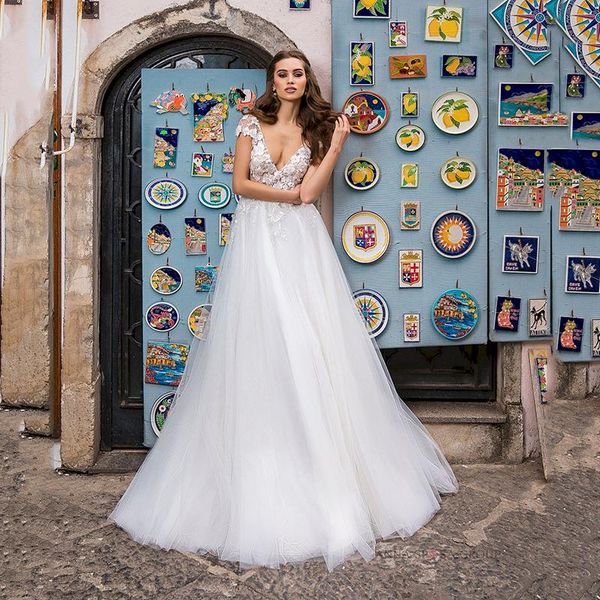 other wedding dresses deep v neck a line africa white lace appliques plus size tulle bridal gowns
other wedding dresses deep v neck a line africa white lace appliques plus size tulle bridal gowns
