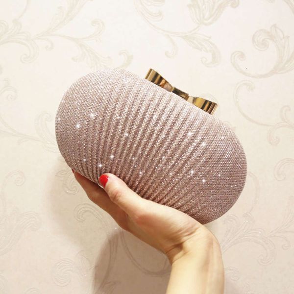 golden evening clutch women bags wedding shiny handbags bridal metal bow clutches chain shoulder bag
golden evening clutch women bags wedding shiny handbags bridal metal bow clutches chain shoulder bag