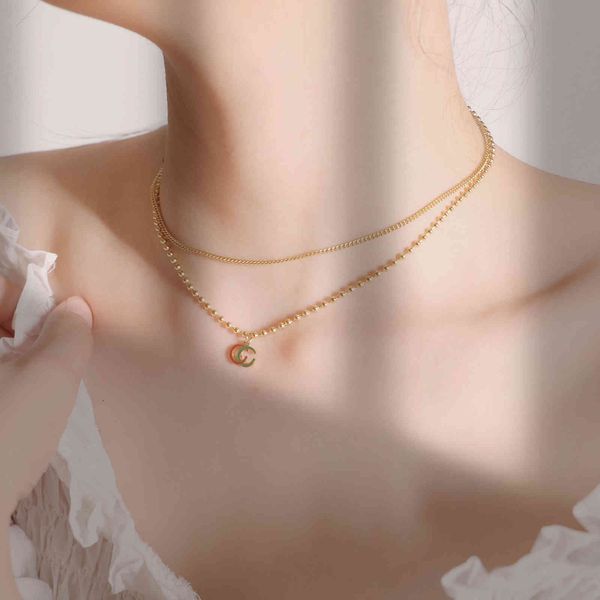 2021 new jewelry decorated titanium steel g's old red and green oil drop color contrast letter bead double-layer necklace neck chain, Silver
2021 new jewelry decorated titanium steel g's old red and green oil drop color contrast letter bead double-layer necklace neck chain, Silver