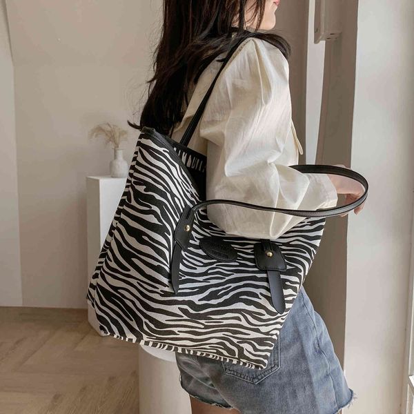 luxury handbags fashion shopping canvas bag single shoulder hand letter large capacity tote women's bag
luxury handbags fashion shopping canvas bag single shoulder hand letter large capacity tote women's bag