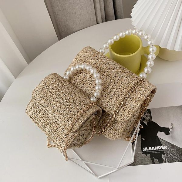 evening bags summer pearl straw woven all-match beach bag 2021 fashion women's designer portable messenger
evening bags summer pearl straw woven all-match beach bag 2021 fashion women's designer portable messenger