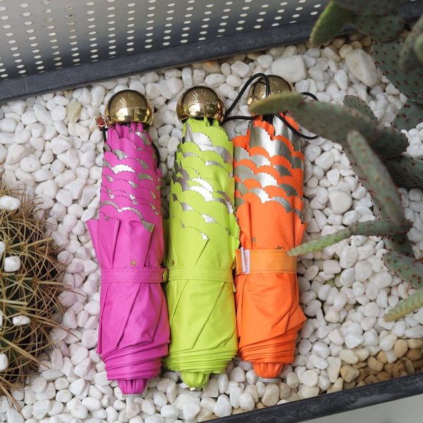 umbrellas three folding umbrella wave edge women gold coating sunshade sunny rain dual purpose windproof strong
umbrellas three folding umbrella wave edge women gold coating sunshade sunny rain dual purpose windproof strong
