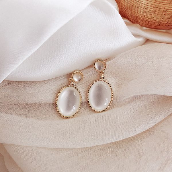 white moon cat's eye stone earrings 925 silver needle french advanced feeling small fresh earrings super fairy simple temperament earri
white moon cat's eye stone earrings 925 silver needle french advanced feeling small fresh earrings super fairy simple temperament earri