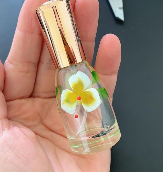 storage bottles & jars 12ml small white flower hand-painted perfume glass bottle empty spray with gold cover 100pcs/lot
storage bottles & jars 12ml small white flower hand-painted perfume glass bottle empty spray with gold cover 100pcs/lot