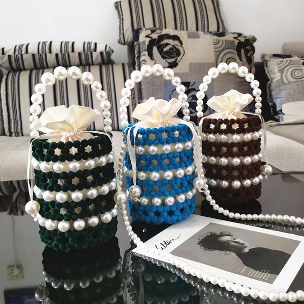 mini pearl hollow bucket bag for women handmade beaded evening clutch bag luxury design wedding party purse and handbag
mini pearl hollow bucket bag for women handmade beaded evening clutch bag luxury design wedding party purse and handbag