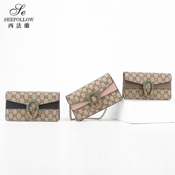 wallet 2021 fashion chain bag women's leather single shoulder messenger simple and versatile snake head small square, Red;black
wallet 2021 fashion chain bag women's leather single shoulder messenger simple and versatile snake head small square, Red;black