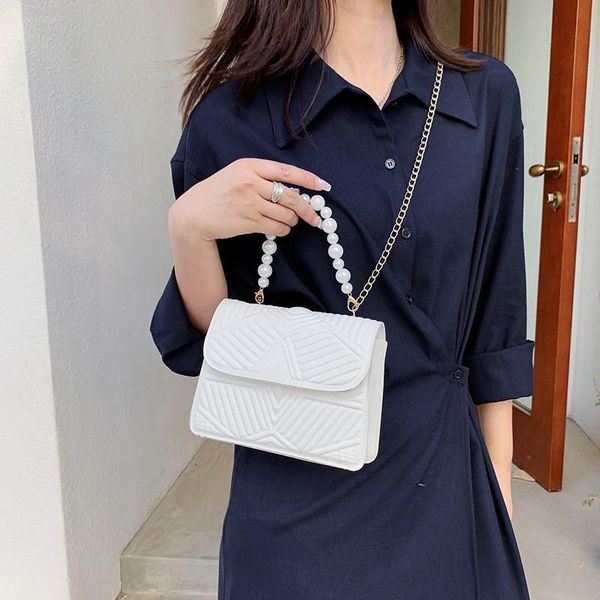evening bags fashion pure color pearl chain decoration women's handbag simple shoulder bag messenger linggra ladies
evening bags fashion pure color pearl chain decoration women's handbag simple shoulder bag messenger linggra ladies