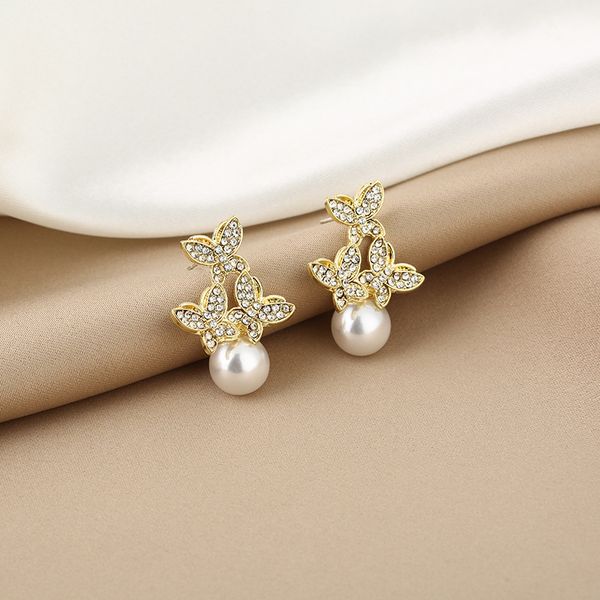 925 silver needle korea east gate temperament diamond butterfly pearl earrings net red fashion personality earrings
925 silver needle korea east gate temperament diamond butterfly pearl earrings net red fashion personality earrings