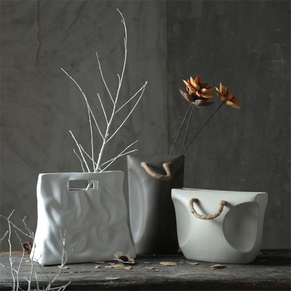 vases bag design porcelain vase home decor art figurines modern ceramic dried flower arrangement crafts floral room decorations
vases bag design porcelain vase home decor art figurines modern ceramic dried flower arrangement crafts floral room decorations