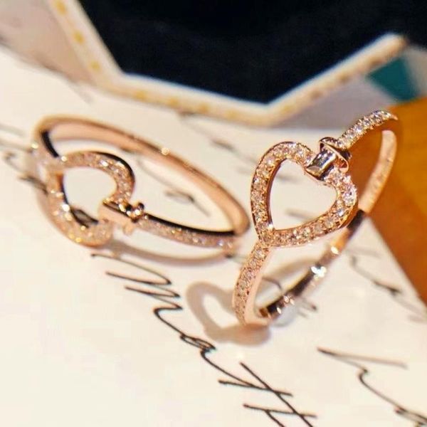 cluster rings rose gold heart ring with bling zircon stone for women fashion jewelry wedding engagement 2021 trend, Golden;silver
cluster rings rose gold heart ring with bling zircon stone for women fashion jewelry wedding engagement 2021 trend, Golden;silver