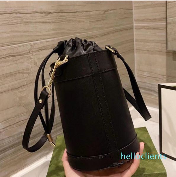 retro saddle buckle drawstring bucket bag women's fashion handbag designer alphabet canvas purse leather shoulder strap2022
retro saddle buckle drawstring bucket bag women's fashion handbag designer alphabet canvas purse leather shoulder strap2022