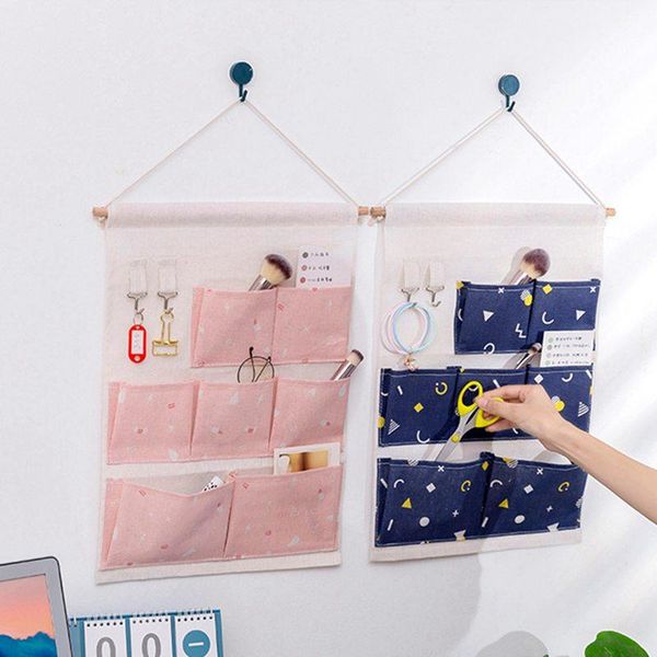 storage bags wall mounted wardrobe organizer sundries bag jewelry hanging pouch hang cosmetics toys
storage bags wall mounted wardrobe organizer sundries bag jewelry hanging pouch hang cosmetics toys