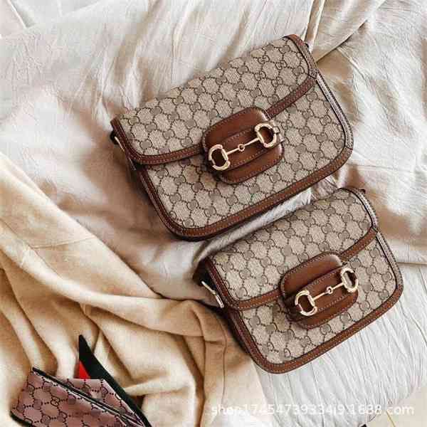 purse summer new saddle messenger bag signature small square printed single shoulder women's bag
purse summer new saddle messenger bag signature small square printed single shoulder women's bag